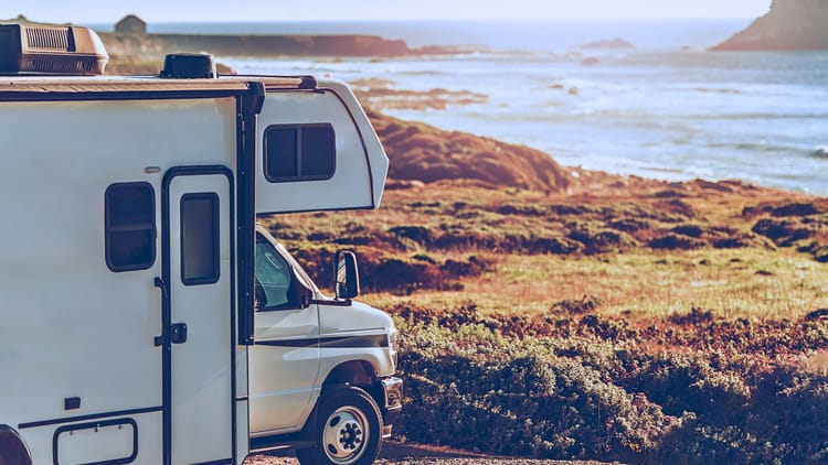 beach rv site of a motorhome parked on a bluff